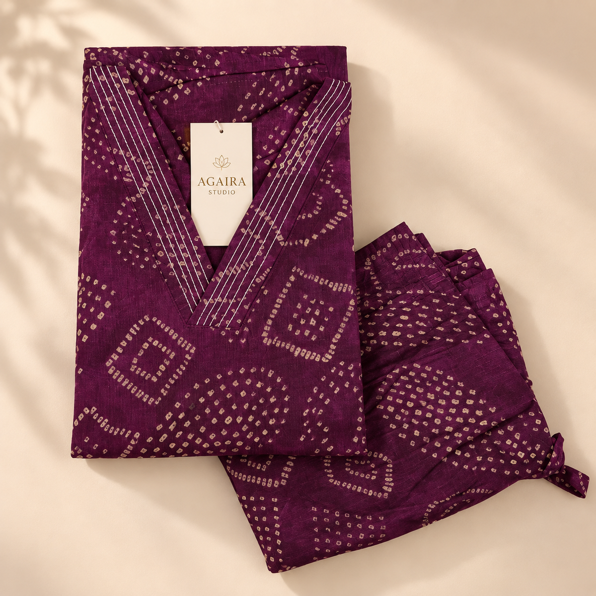Burgundy bandhani Vatican silk co-ord set with kurta and churidhar. Traditional Indian everyday elegance.