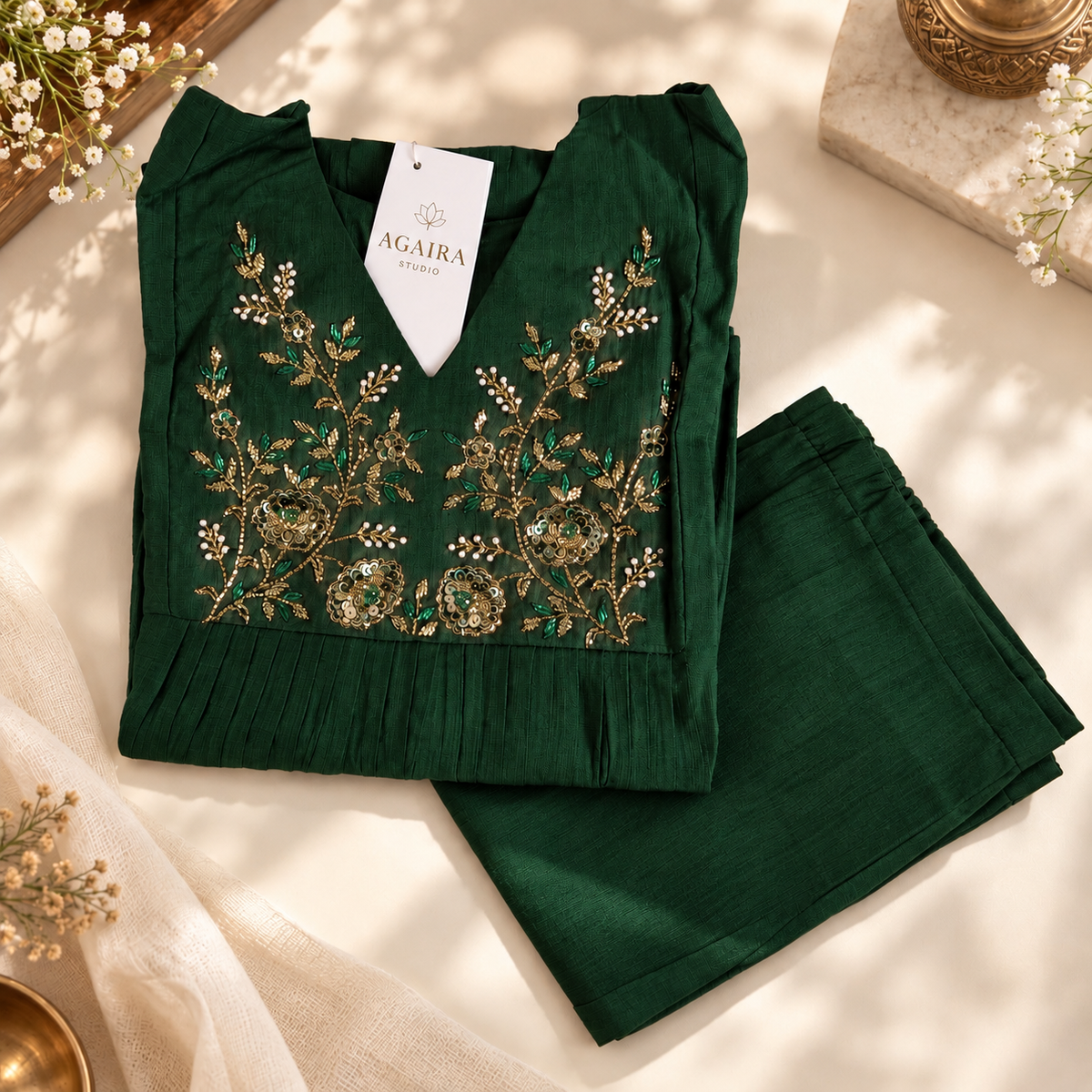 Green Vatican silk co-ord with hand-embroidered gold detailing. Festive gathered kurta set.
