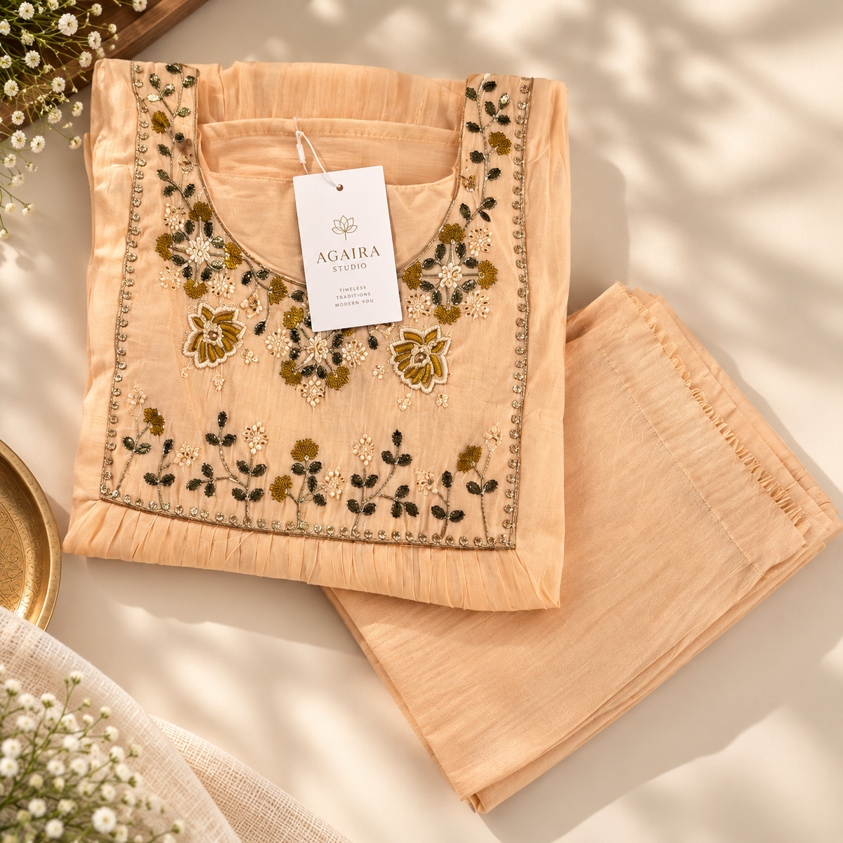 Beige mul Chanderi co-ord with hand-embroidered neckline. Traditional A-line kurta set.
