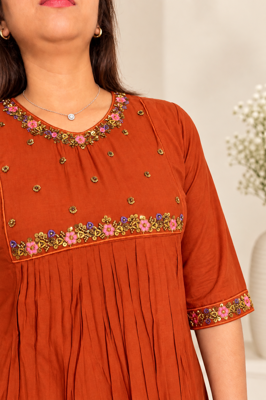Rusty orange mul co-ord with hand-beaded embellishments. Festive embellished traditional kurta.