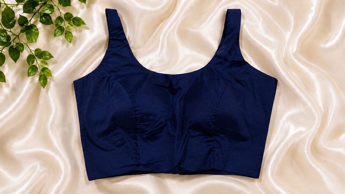 Emerald green padded cotton Lycra sleeveless blouse. Comfortable stretchable saree blouse.