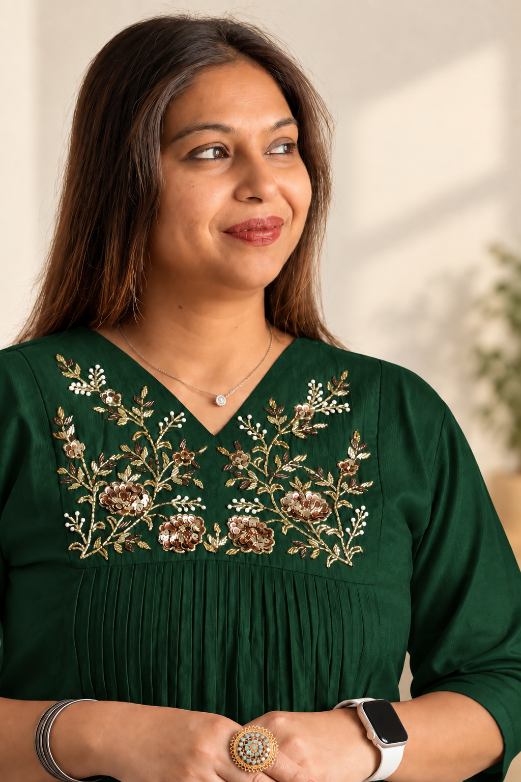 Green Vatican silk co-ord with hand-embroidered gold detailing. Festive gathered kurta set.