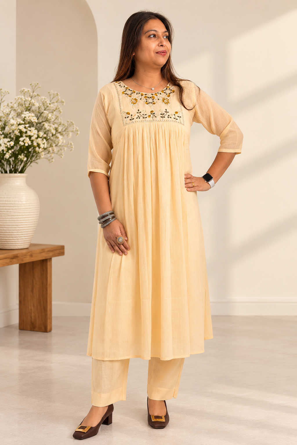 Beige mul Chanderi co-ord with hand-embroidered neckline. Traditional A-line kurta set.