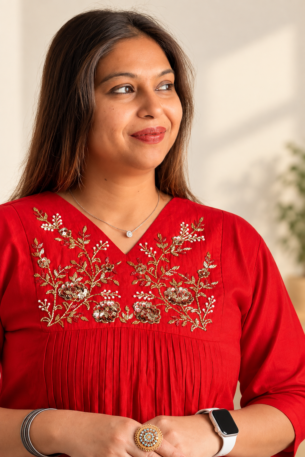 Red Vatican silk co-ord with hand-embroidered gold detailing. Festive gathered kurta set.