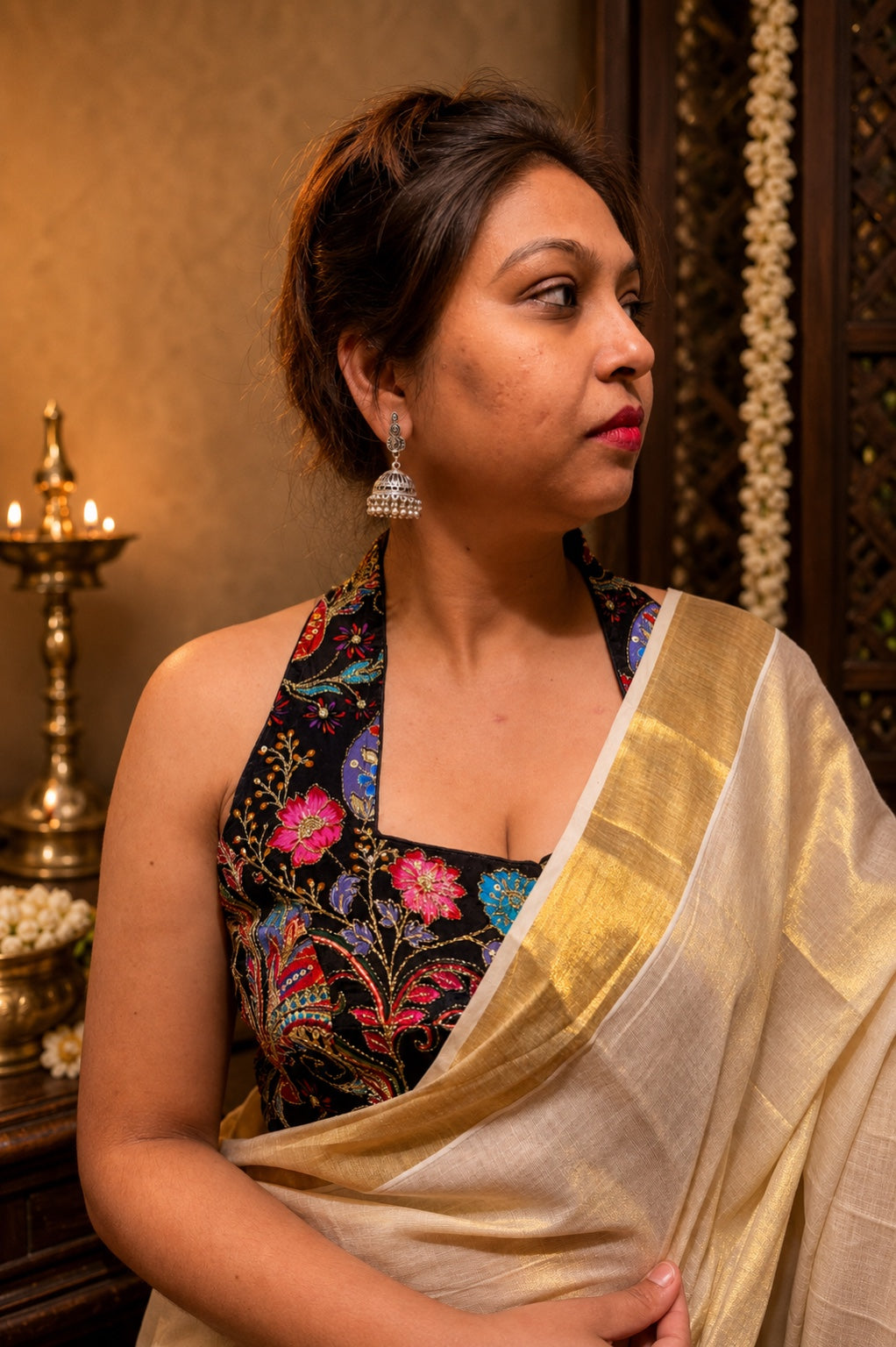 Firozi turquoise halter neck blouse styled with saree